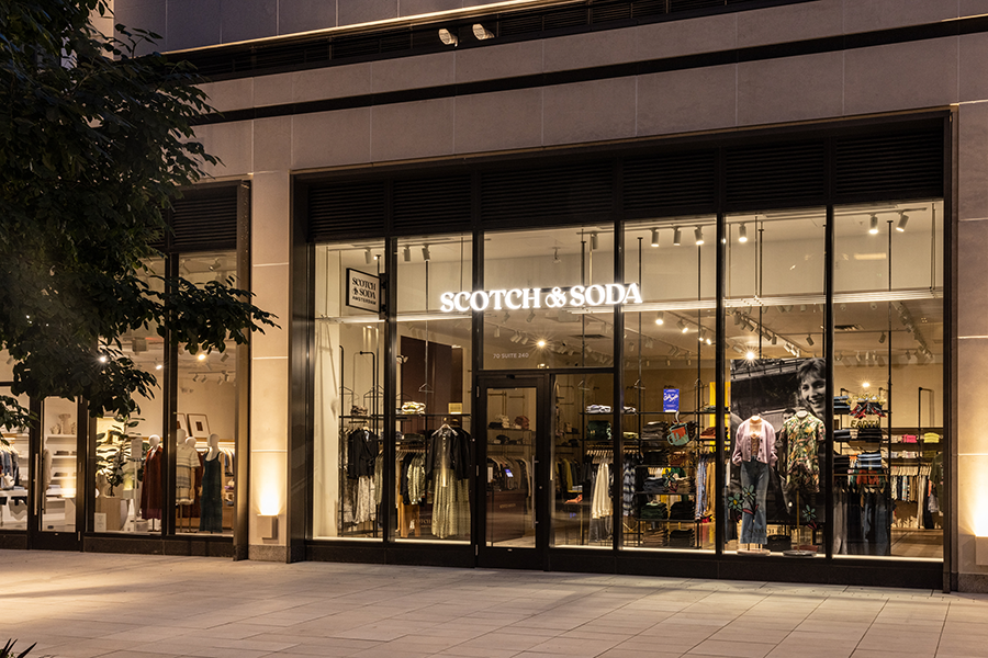 Facade of a Scotch & Soda store where Apple Wallet and Google Wallet passes can be used